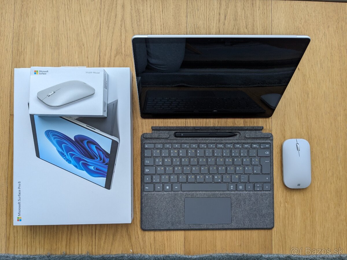 Microsoft Surface Pro 8 with keyboard and mouse
