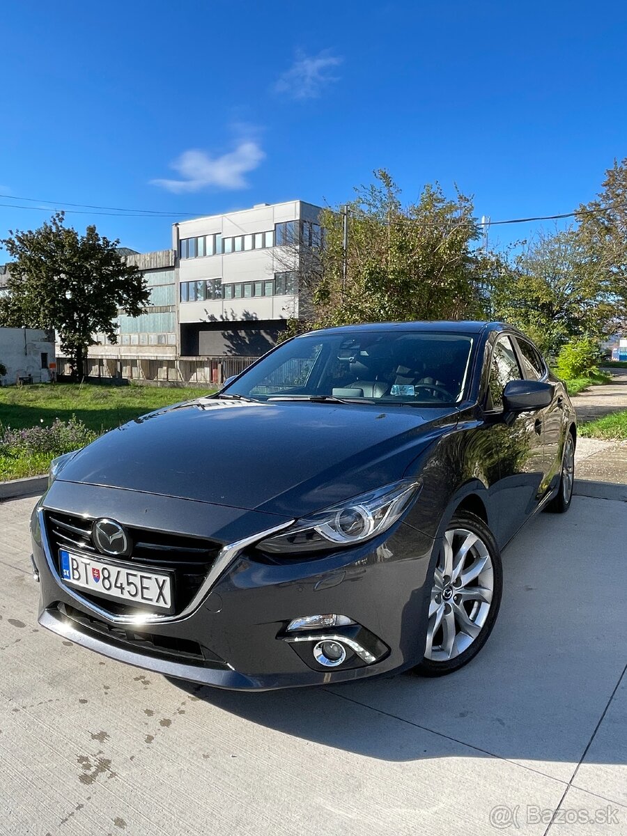 Mazda 3 Skyactiv-G165 Revolution Top