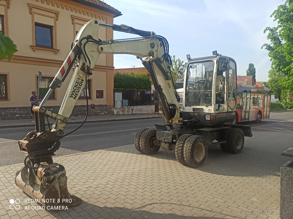 Kolový bagr kolove rypadlo Wacker Neuson 6503,CAT JCB Volvo