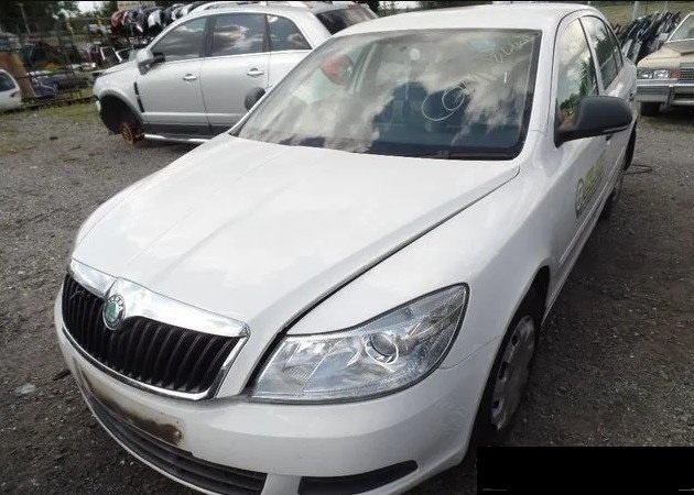 Rozpredam Skoda Octavia2 Facelift 1,9tdi 77kw biela 1026,