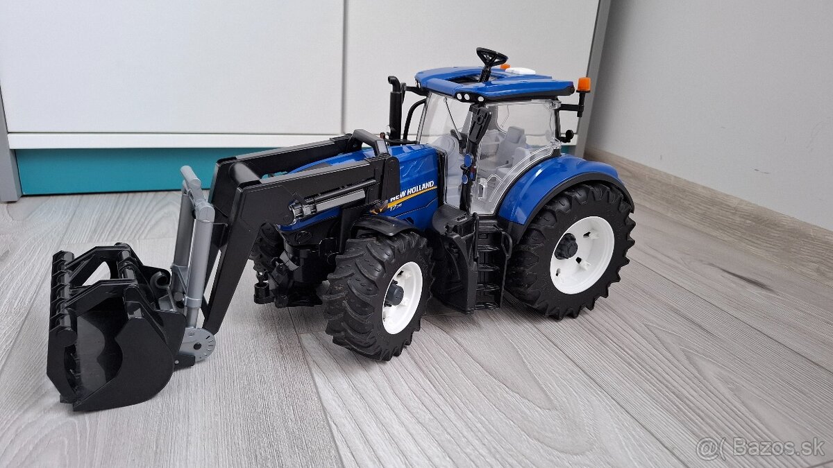 Traktor New Holland s prednou lyžicou Bruder