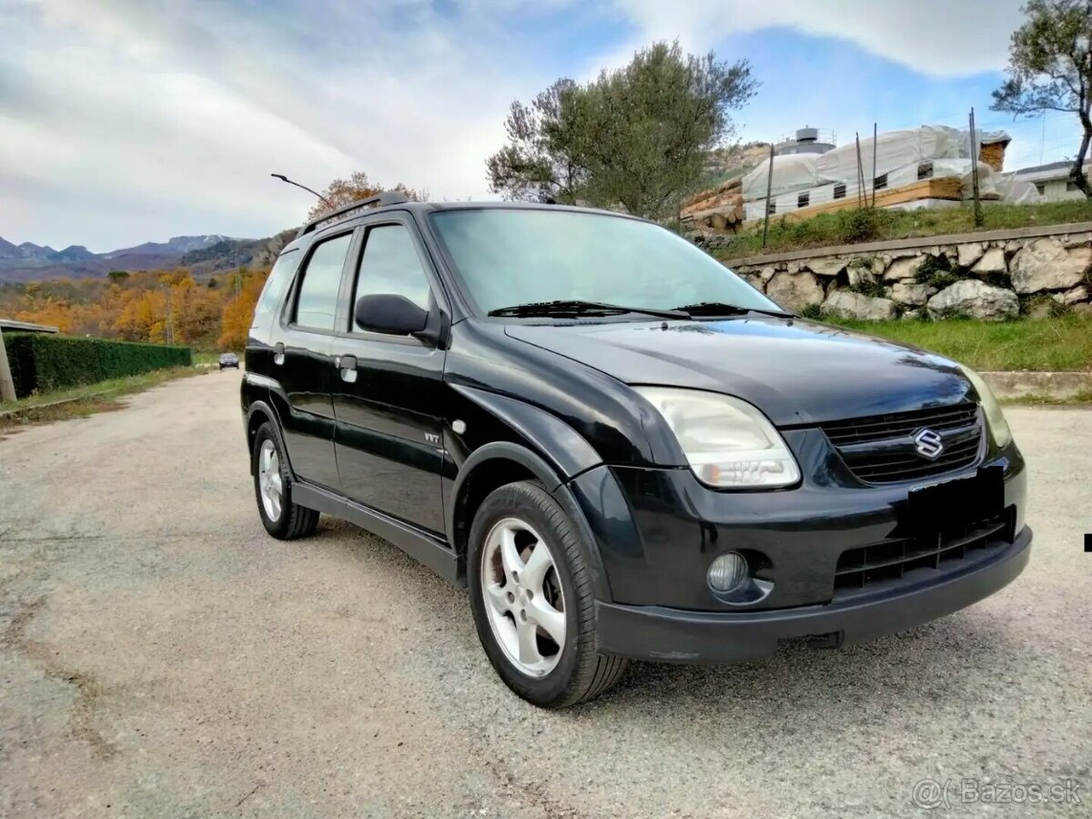 Suzuki Ignis, subaru justy,1.3 4x4 2005 čierna farba