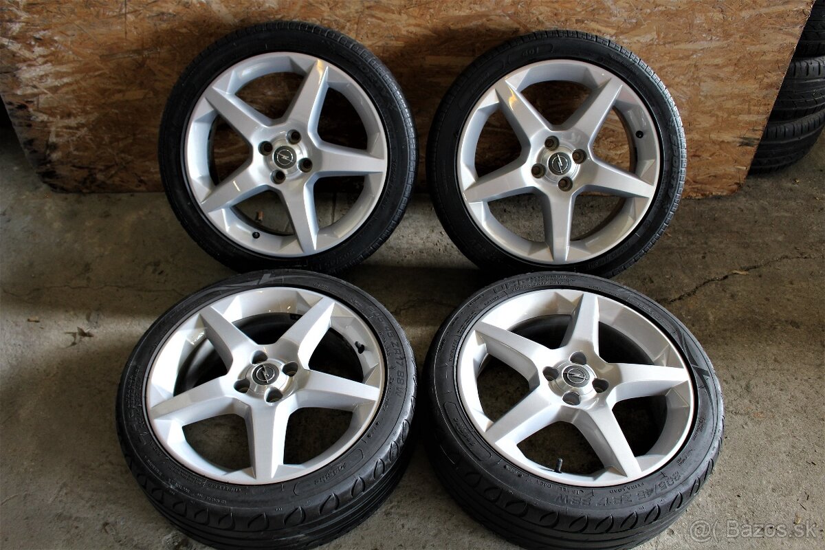 17"...4x100 r17.....ORIGINAL....OPEL-TIGRA 2......LETNA.SADA