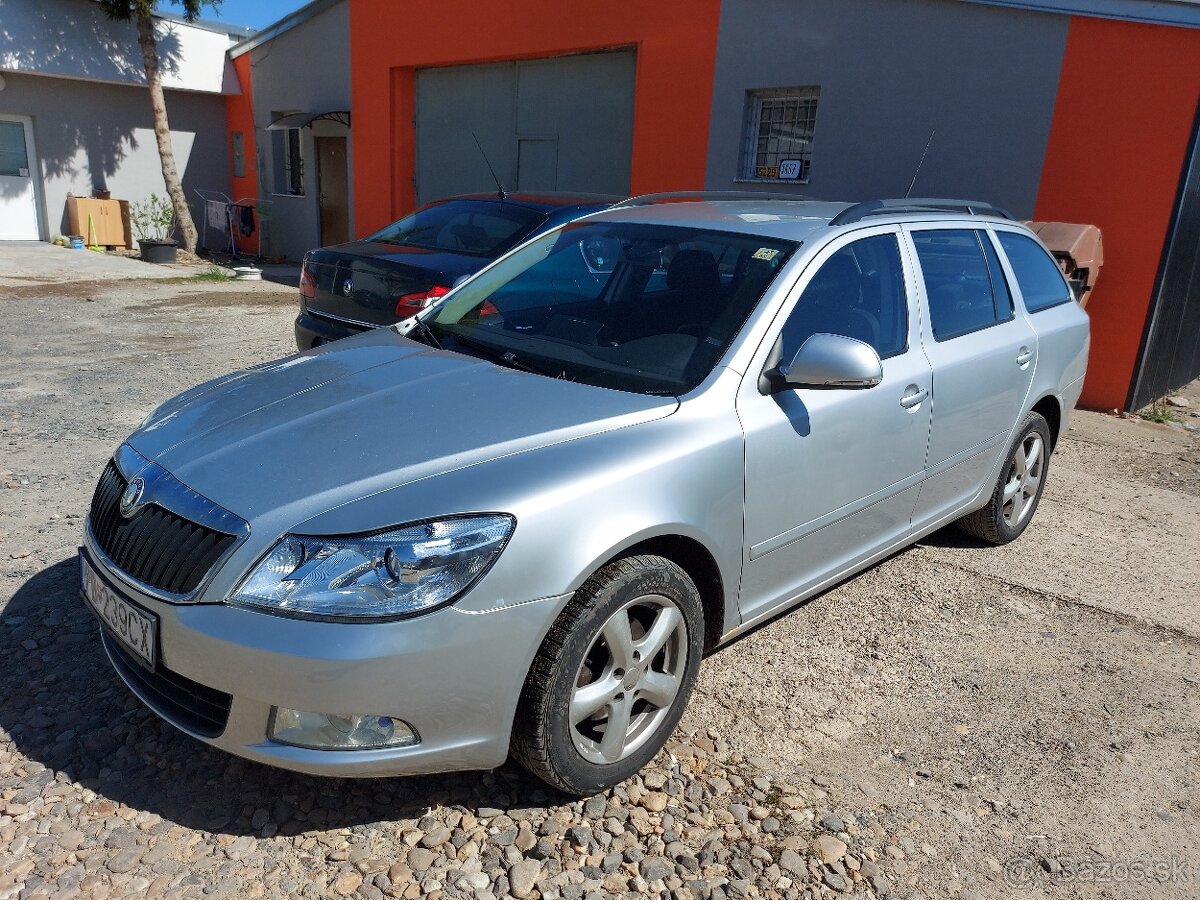 Rozpredam Skoda Octavia 2 1,6tdi 77kw farba 9156,strieborna,