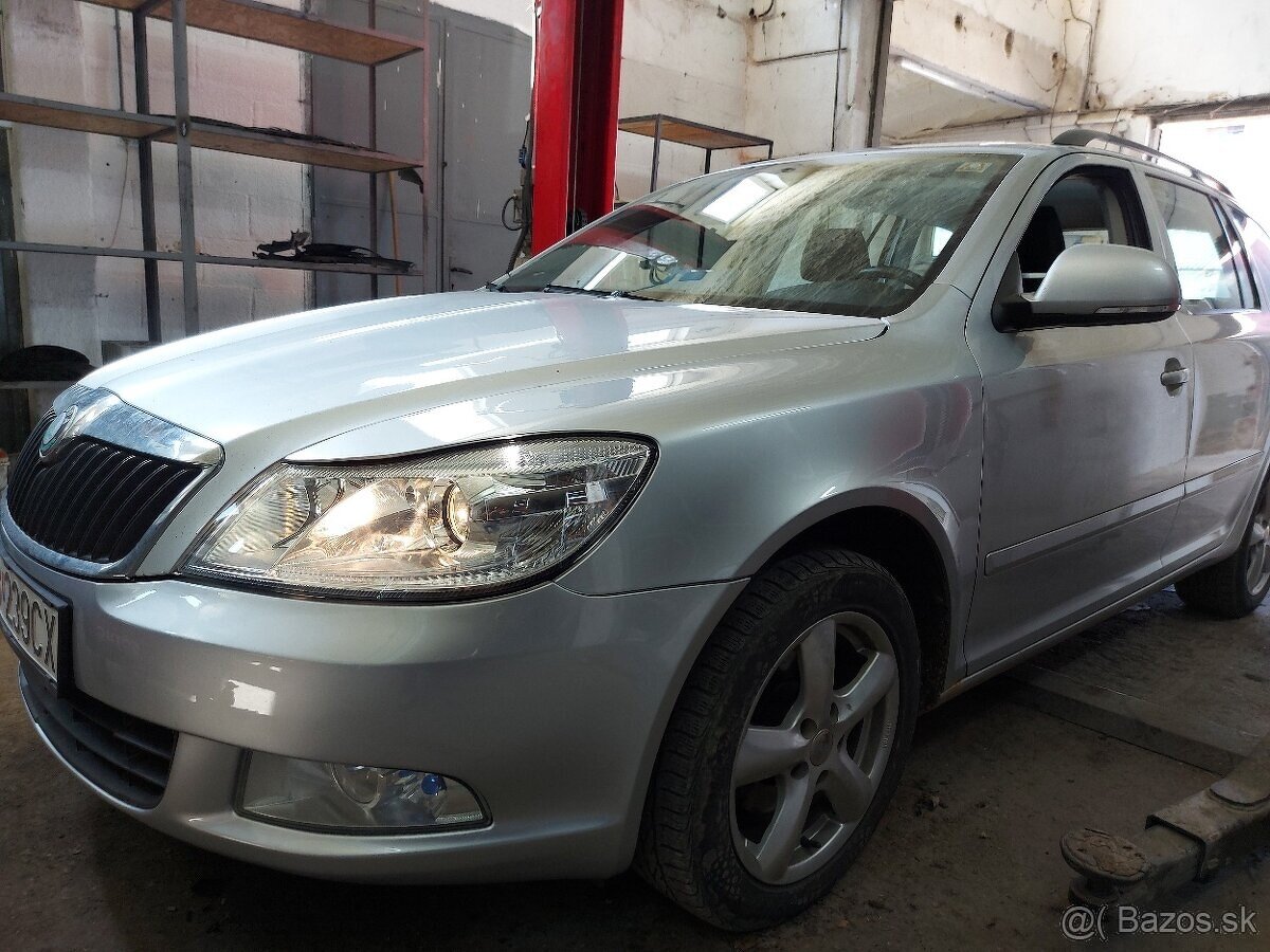 Rozpredam Skoda Octavia 2 Facelift 1,6tdi 77kw farba striebo