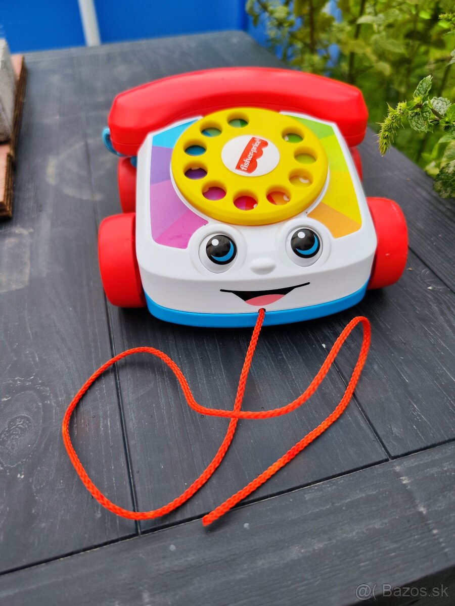 Malo hrany Fisher Price telefonik na tahanie