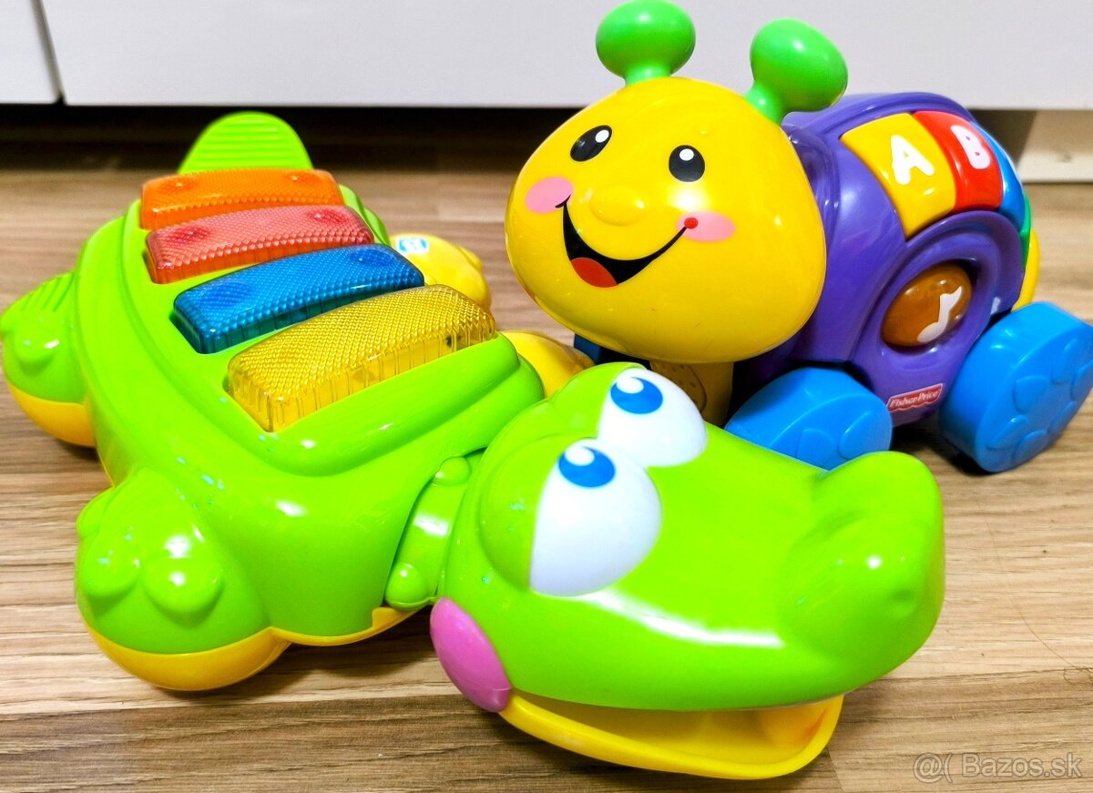 značkové HUDOBNÉ HRAČKY FISHER PRICE slimák+krokodíl