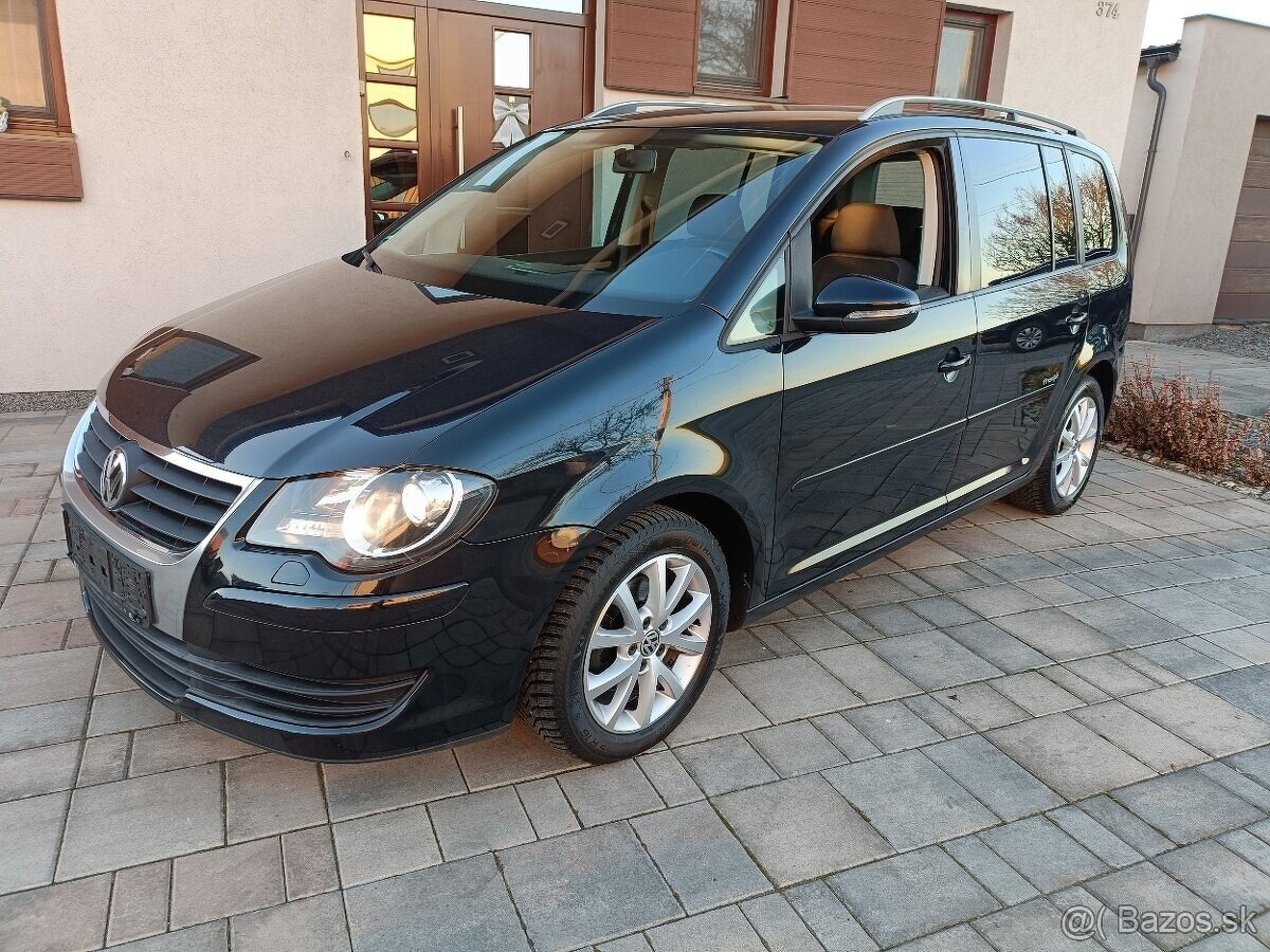 VOLKSWAGEN TOURAN 1.9 TDI 77 KW FREESTYLE BLUEMOTION