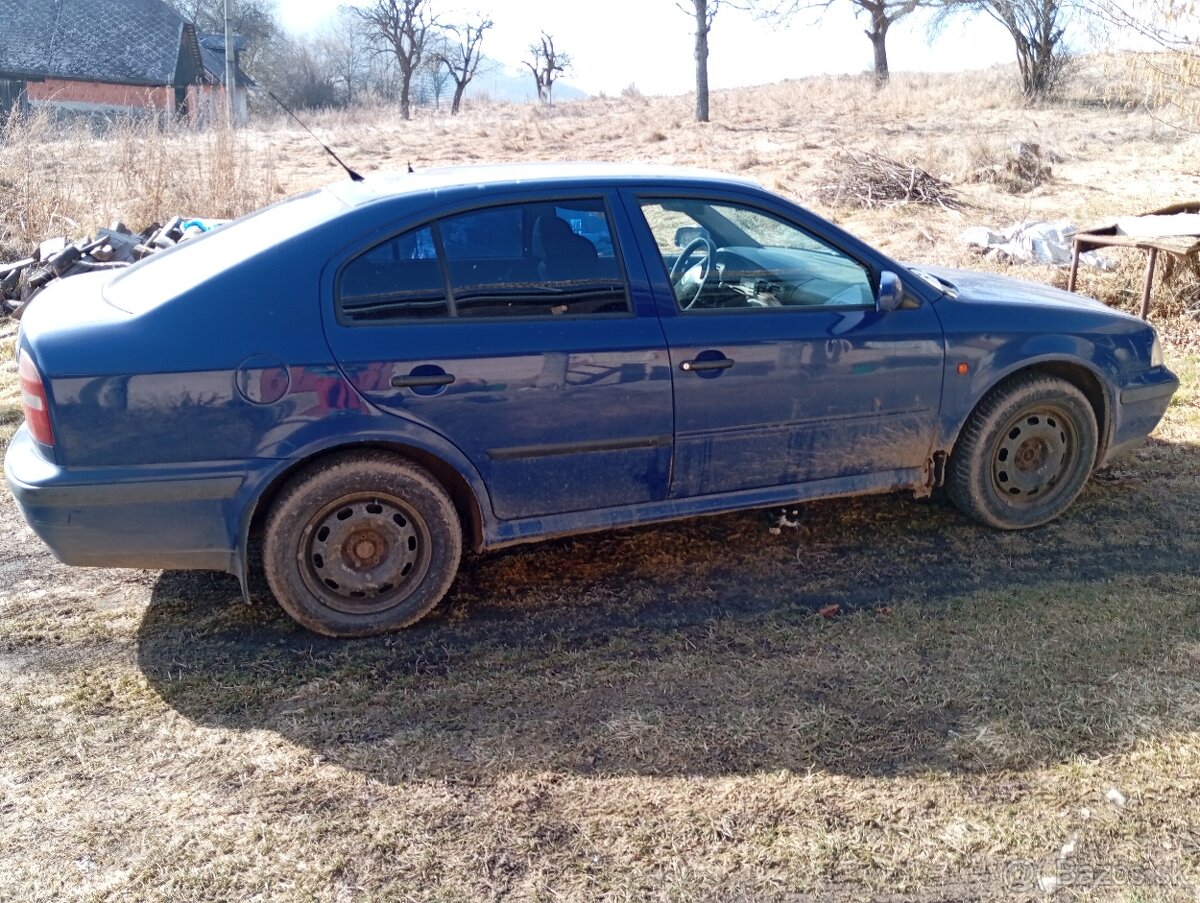 Škoda Octavia 1.6 benzín,r.1999,  platná STK a EK