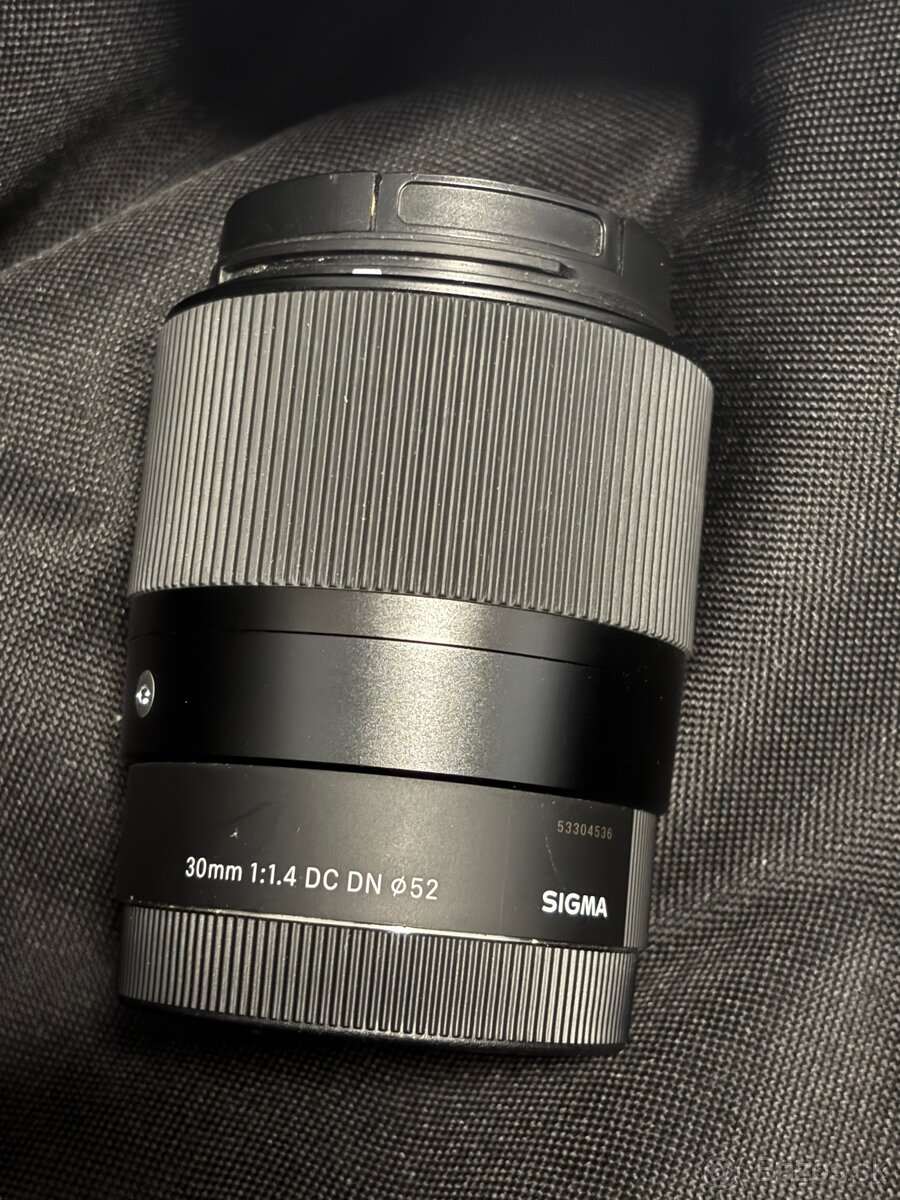 Sigma 30mm 1:1.4 DC DN 52