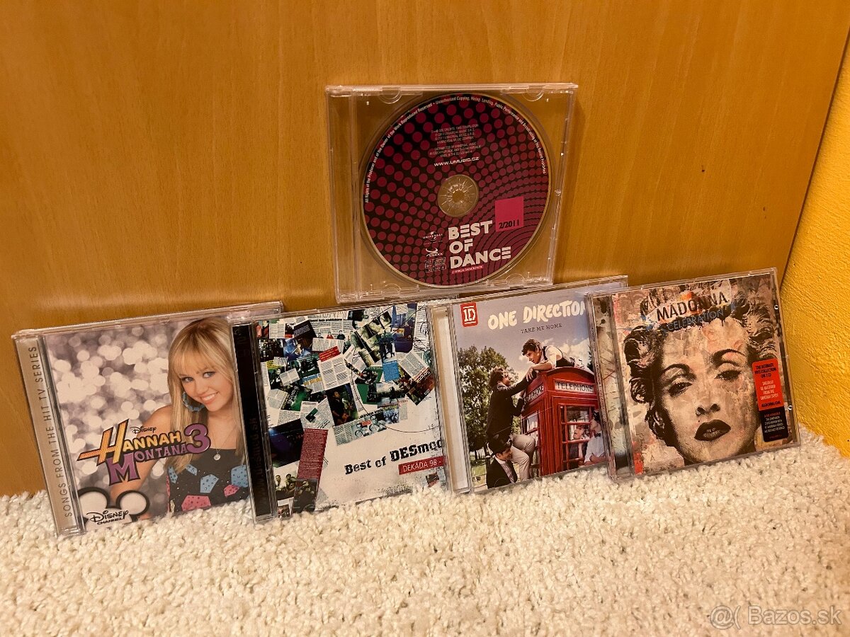 CD albumy - Madonna, Desmod, Hannah Montana, One Direction