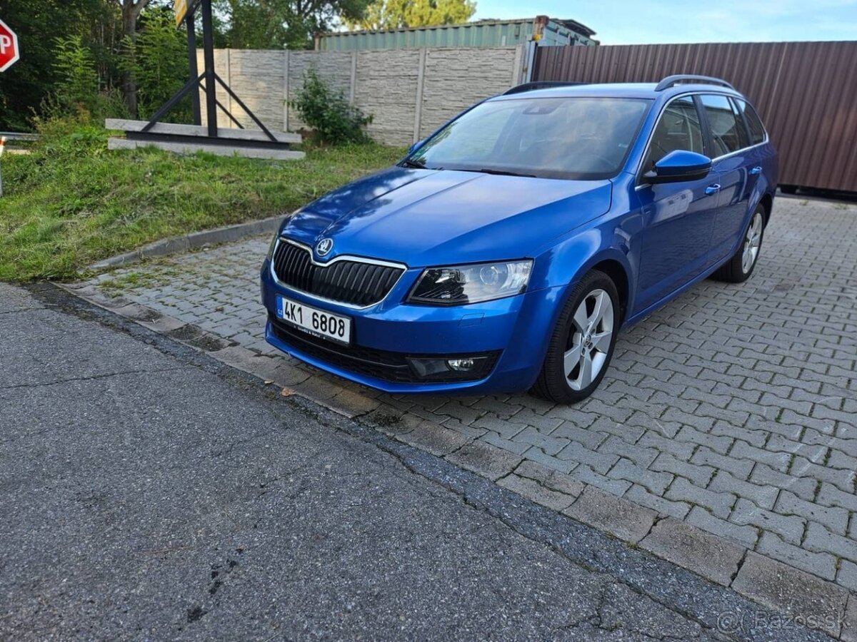 ŠKODA OCTAVIA COMBI 2.0 TDI / XENON / NAVI / LEHKÉ POŠKOZENÍ