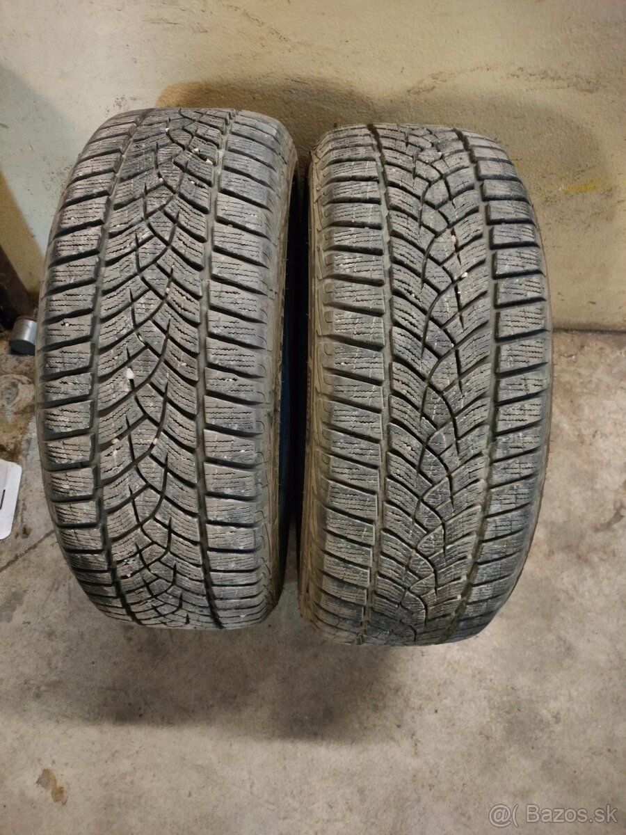 Predám 2 ks zimných pneu Goodyear ultragrip 215/55 r17