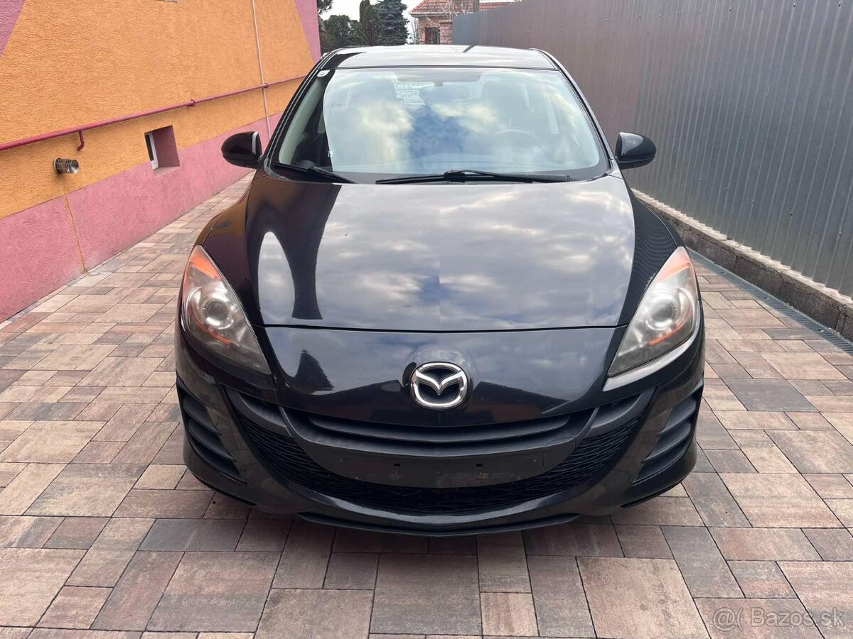 Predám Mazda 3---1.6i-benzin--77Kw-105Ps-org.-157200km