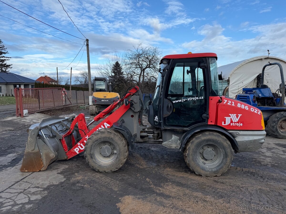 JCB 406B, kolový kloubový nakladač