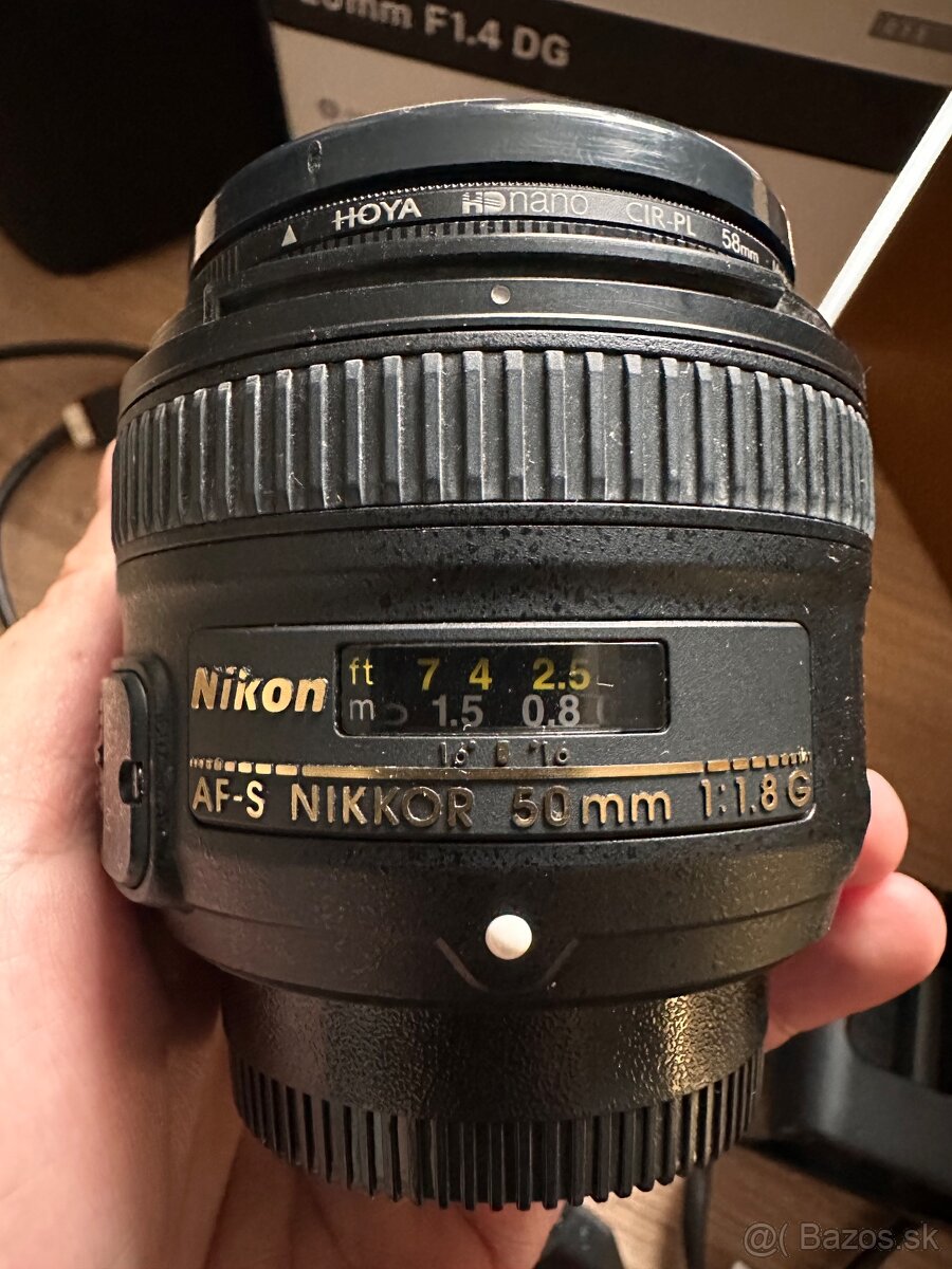 Nikkor 50mm f1,8 s krabicou a cpl filtrom