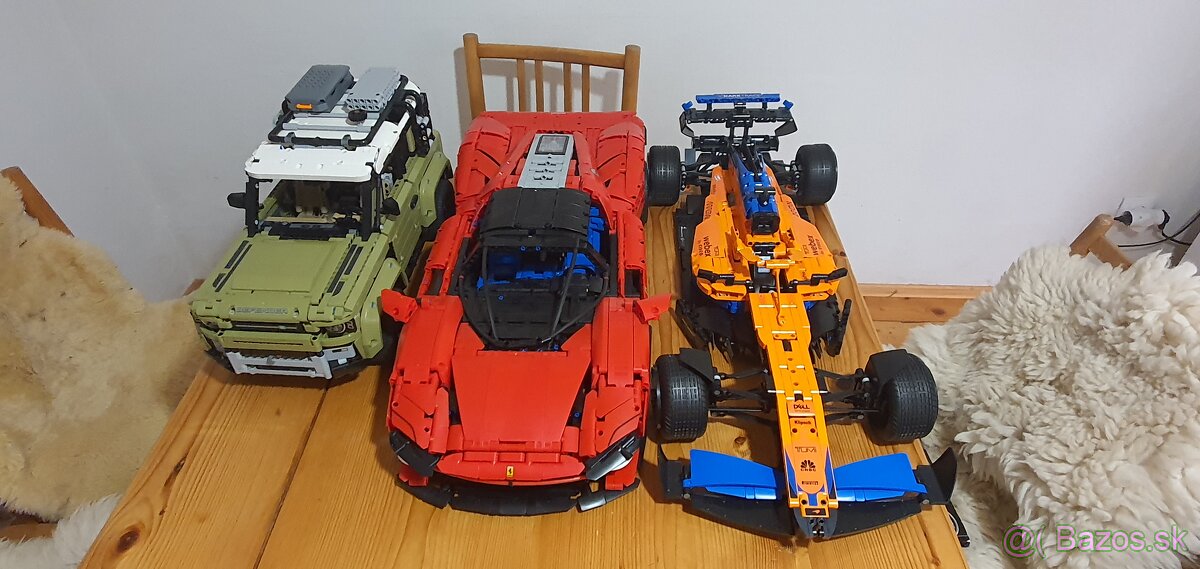 Ferarri daytona sp3, land rover defender, formula 1 mclaren