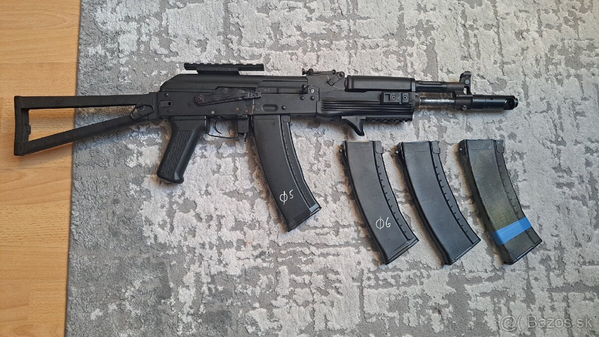 AK105