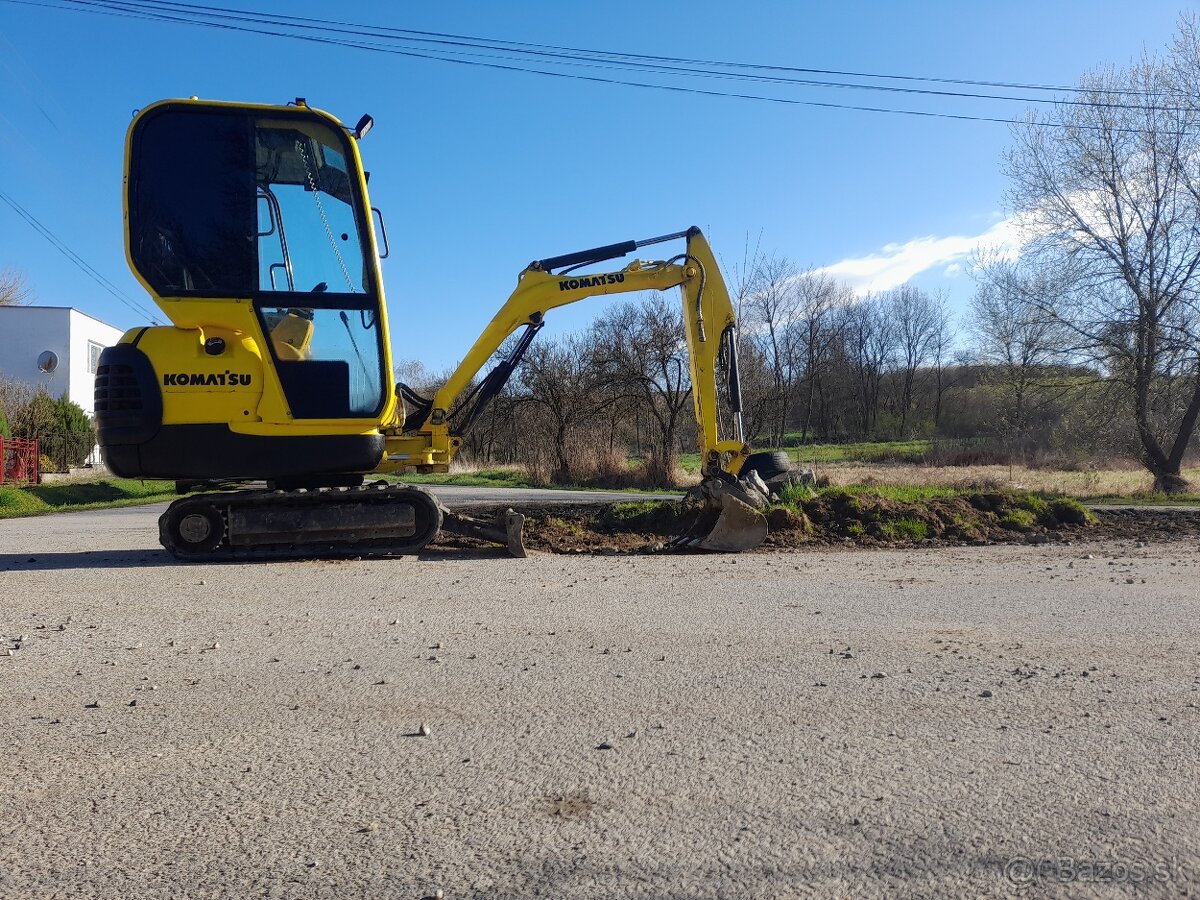 Báger komatsu pc15-r8