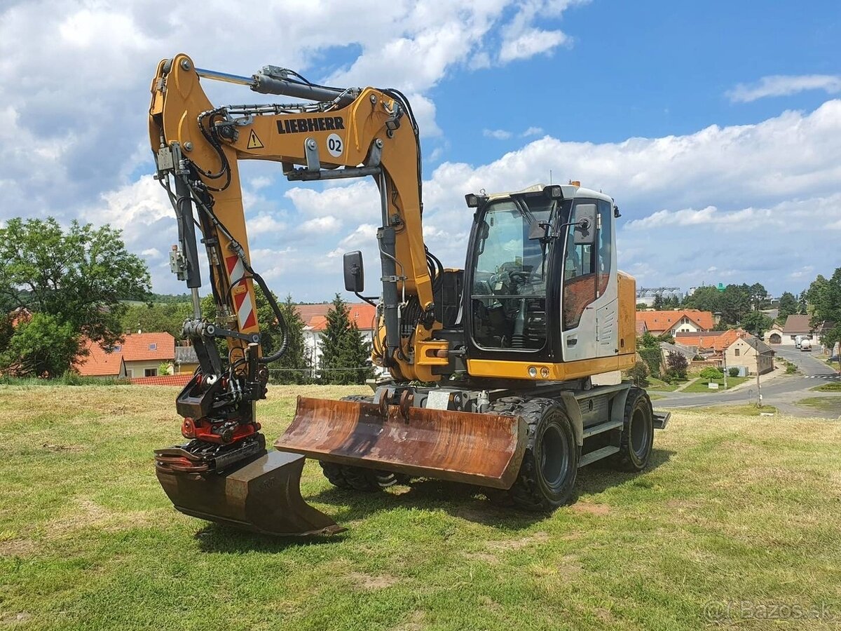 Kolesové rypadlo Liebherr 910