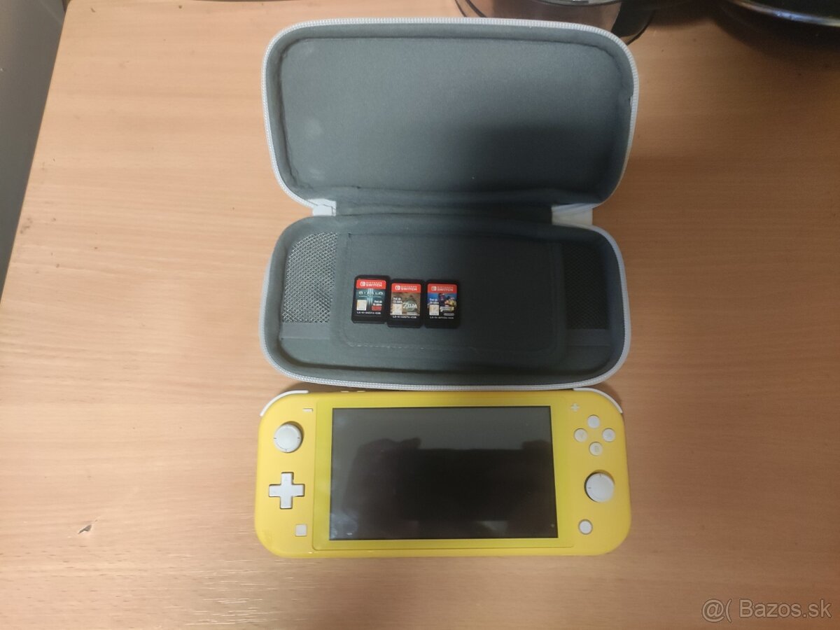 Nintendo switch lite + 3 hry