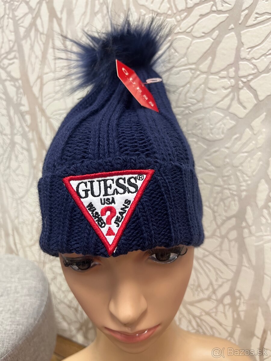 Tmavo modra damska guess ciapka s brbolcom