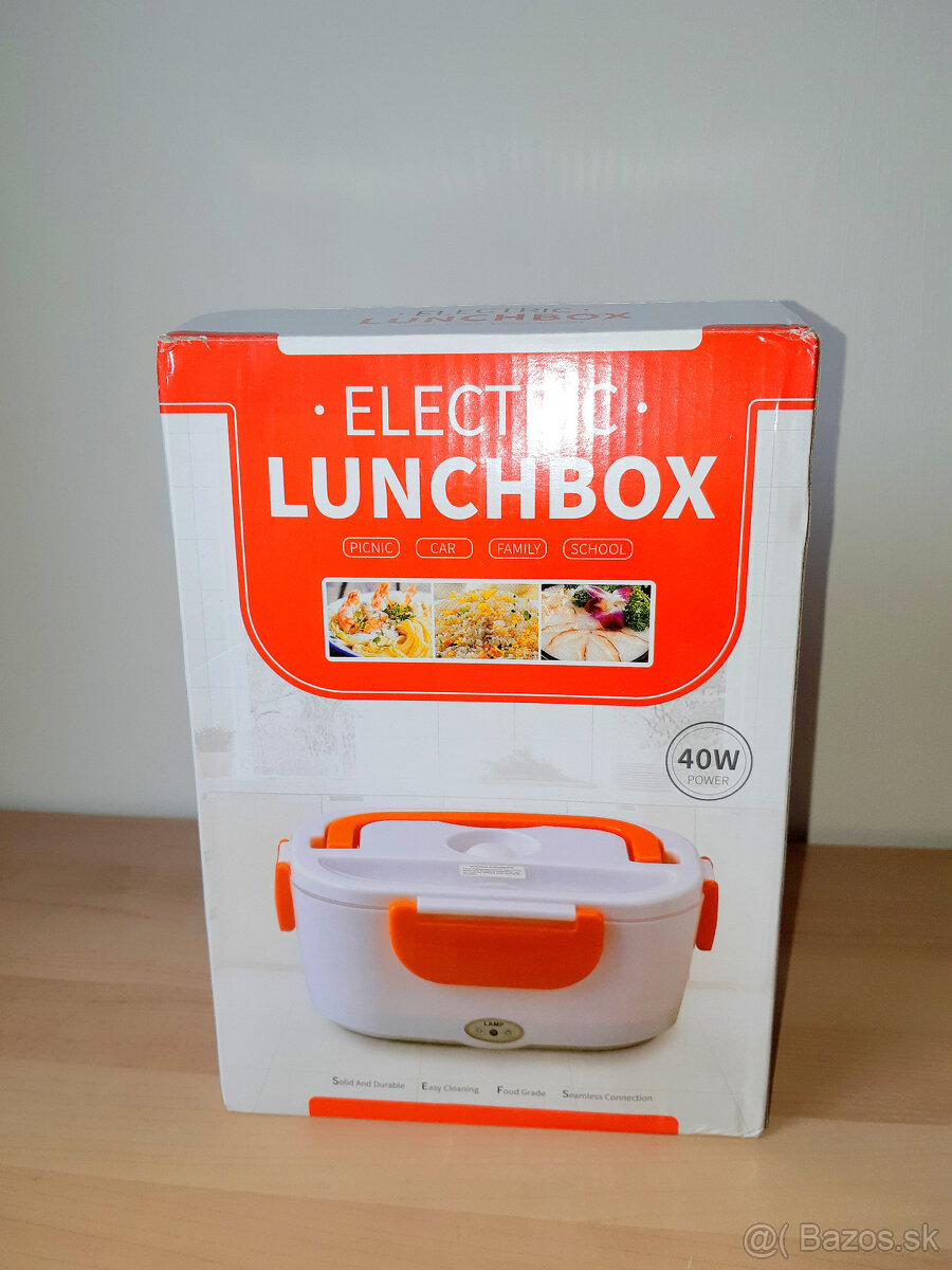 Nový neodbalený cestovný ohrievač jedla (lunchbox)