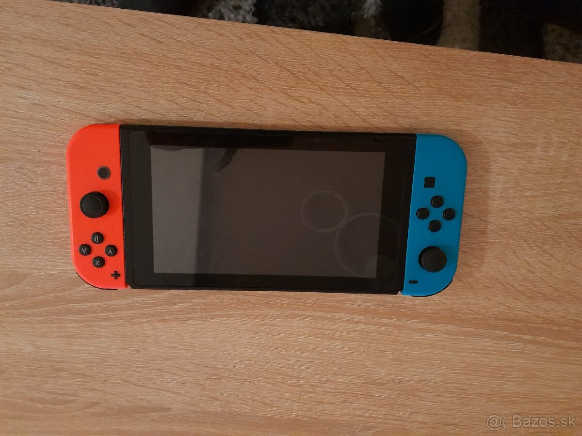 Nintendo switch+puzdro+hry