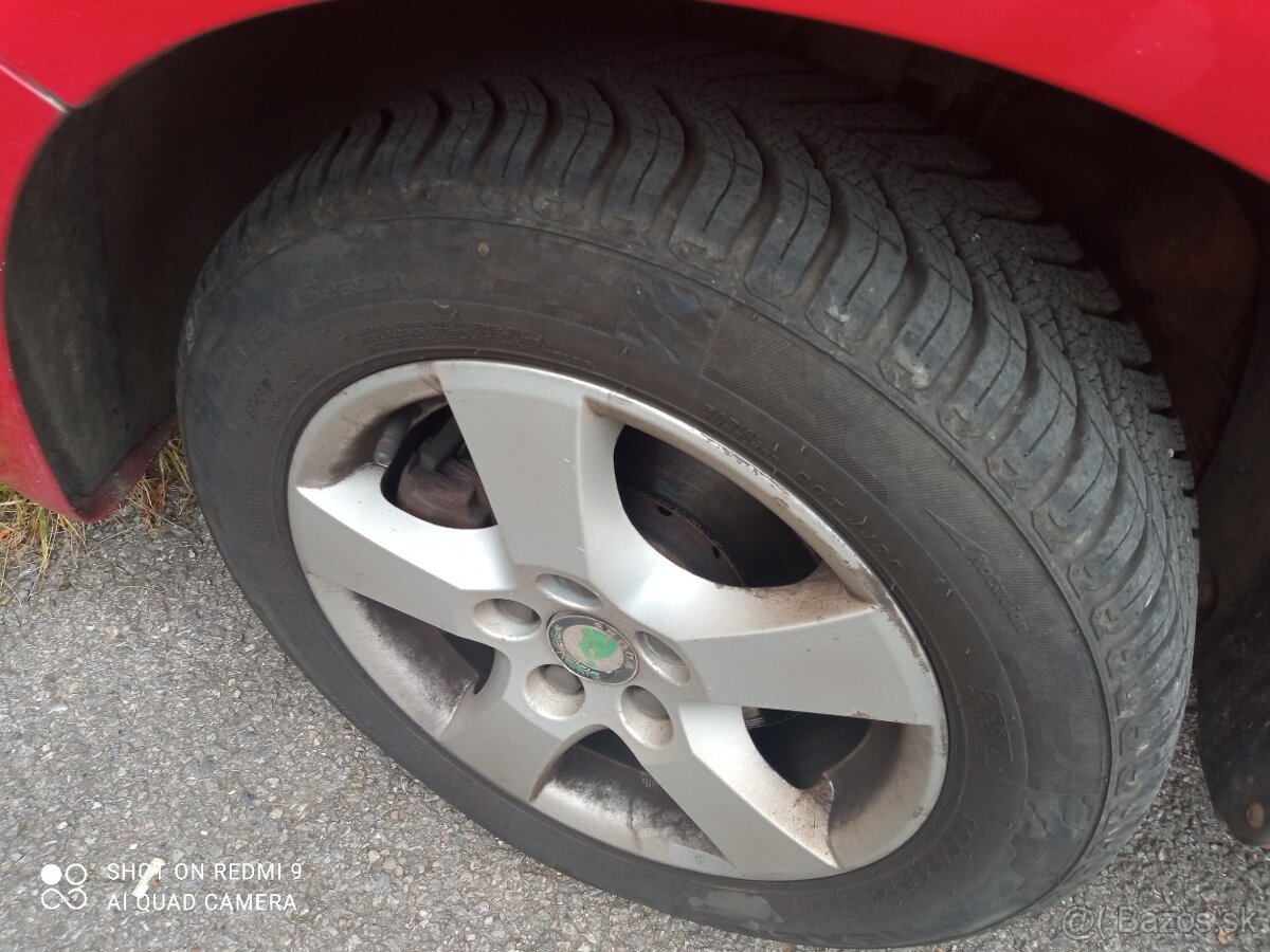 disky 5x100r14 škoda Fabia 1 s celoročnými pneu 185/60R14