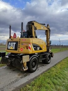 Kolesový bager Caterpillar 313D ,Rototilt, 3D nivelace Leica