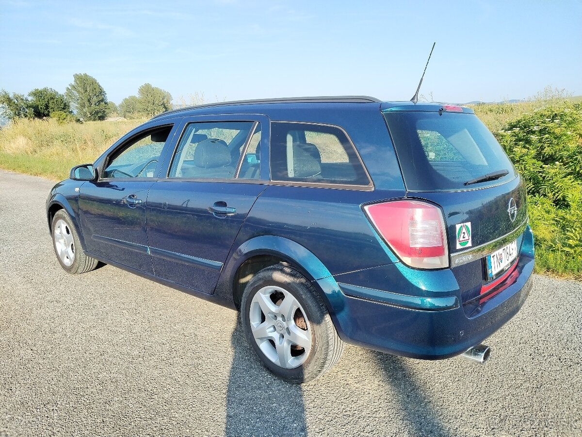 Astra H kombi 1,6 77 Kw benzín