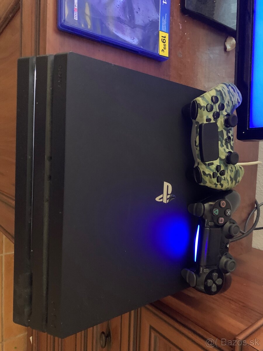 Playstation 4 pro + hry