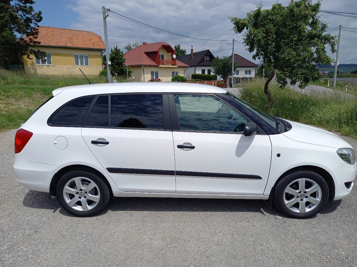 Škoda fabia 2 1.6tdi r.2012 biela na nahradné diely