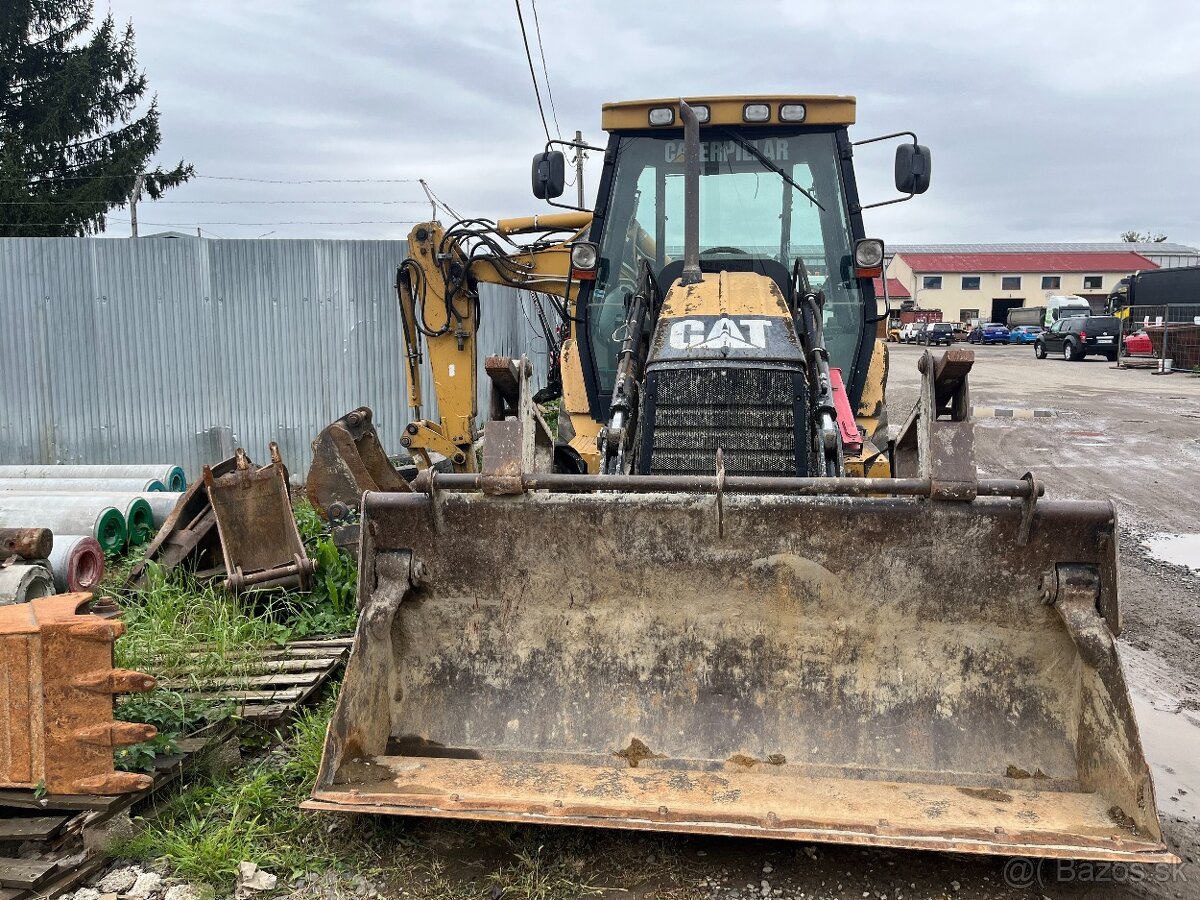 Traktorbager CAT428D