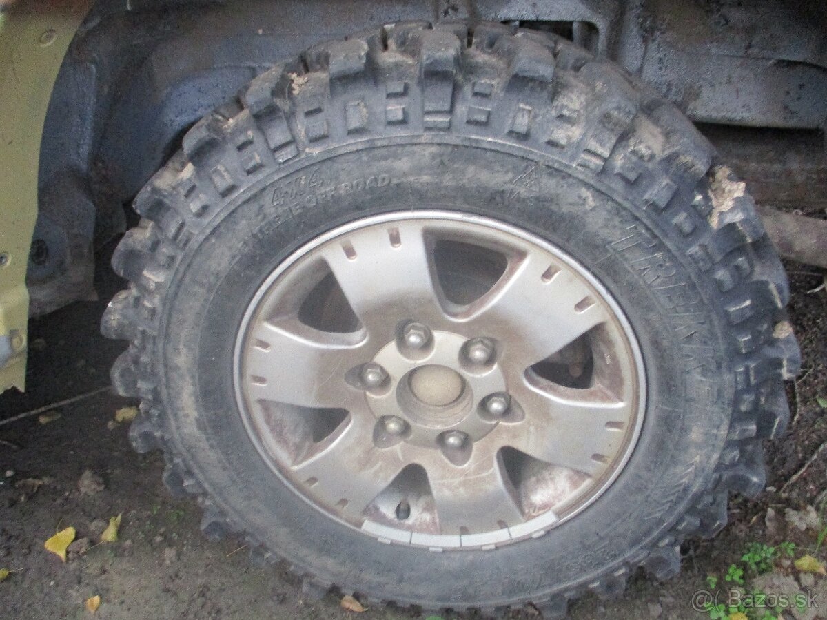 Mitsubishi Pajero alu disky + pneu off road 235/70 R16