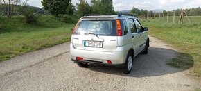 Suzuki Ignis 1.5i 4x4 - 10