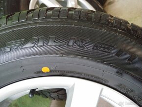 Subaru disky R16 zimné pneu Falken 215/65 - 10