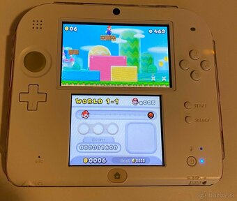 Nintendo 2DS + 64gb - 10