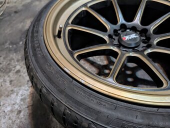 18" XXR 557 - 5x100 a 5x114,3 - 10