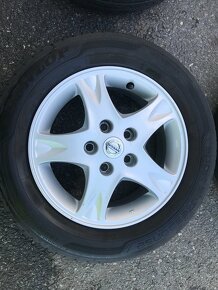 Alu kola Nissan Almera Tino 195/65 R15 - 10