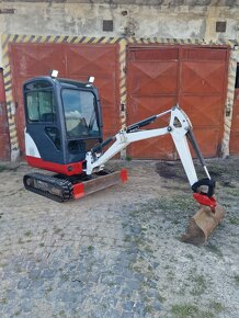 Minibager  Bobcat 319 - 10