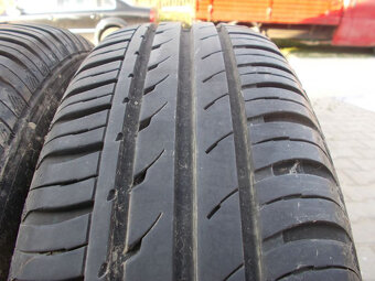 Plechové disky Ford + 185/65R14 - 10