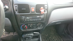 Nissan Almera N16 1,5i - 10