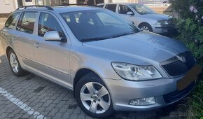 ŠKODA OCTAVIA 1.6(75kw) SLEVA(zadní dveře v elekt - 10