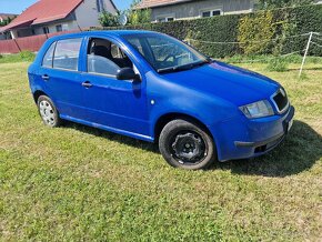 Skoda fabia 1.2 - 11