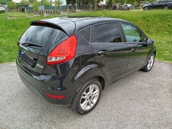 Ford fiesta 1.4 tdci - 11