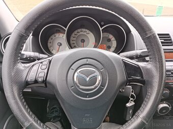 Mazda 3 1,4i klima Nové v ČR 2008 - 11