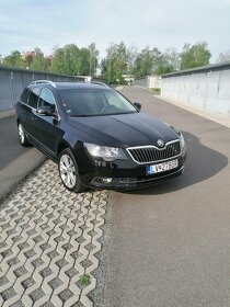 Skoda superb 2 facelift 2.0 tdi dsg 103kw - 11