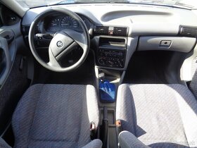 Opel Astra 1.4 GL - 11