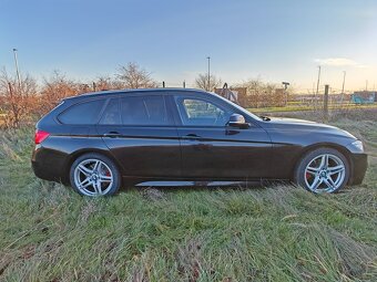 BMW rad 3 Touring 330d - 11